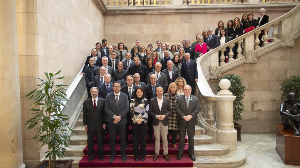 Representants institucionals i acadèmics de la UVic-UCC al Parlament de Catalunya, després de l'audiència, el 30 de gener